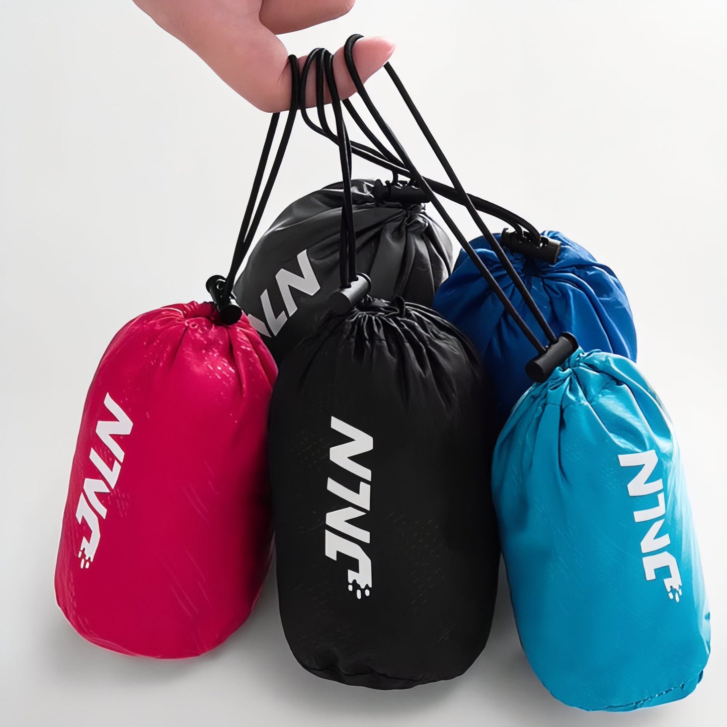 Pantalon Étanche Randonnée quatre sacs en main - Gris Foncé - Noir - Bleu Ciel - Turquoise - Rouge
