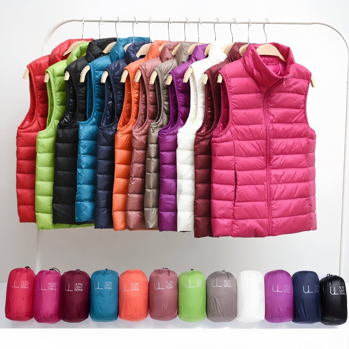 Doudoune Sans Manche Randonnée Femme variantes de couleurs - Fuchsia - Violet - Rouge - Bordeaux - Taupe - Bleu Marine - Vert - Rose Poudré - Noir - Bleu Ciel