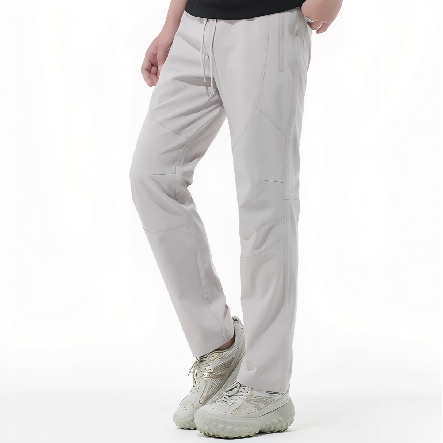 Pantalon Léger Randonnée Homme portée sur un modèle - Gris Clair - Noir Profond - Gris Foncé
