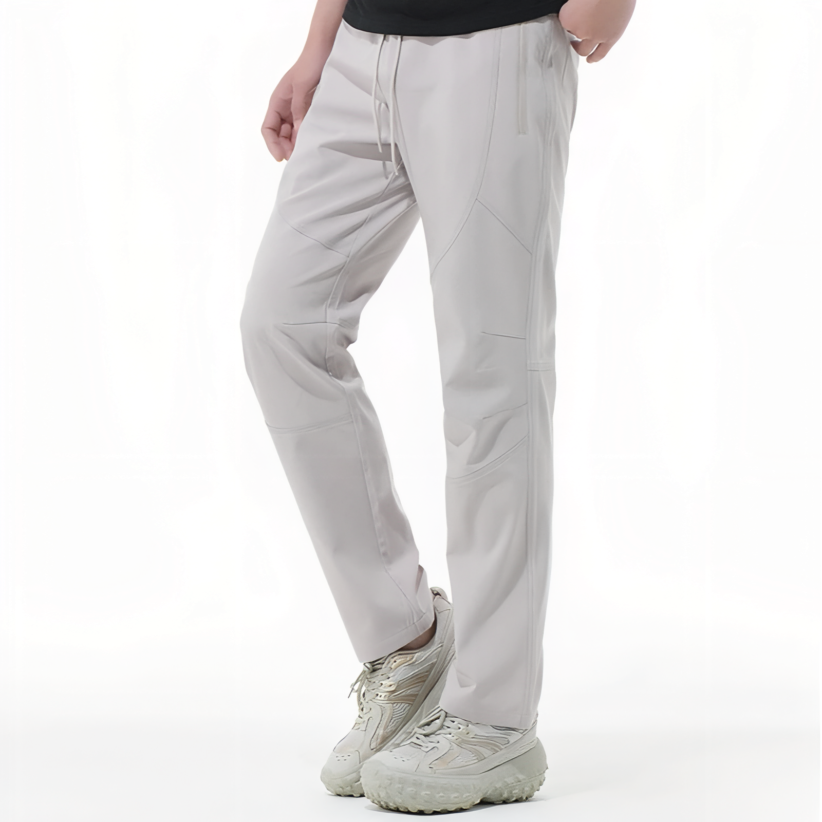 Pantalon Léger Randonnée Homme portée sur un modèle - Gris Clair - Noir Profond - Gris Foncé