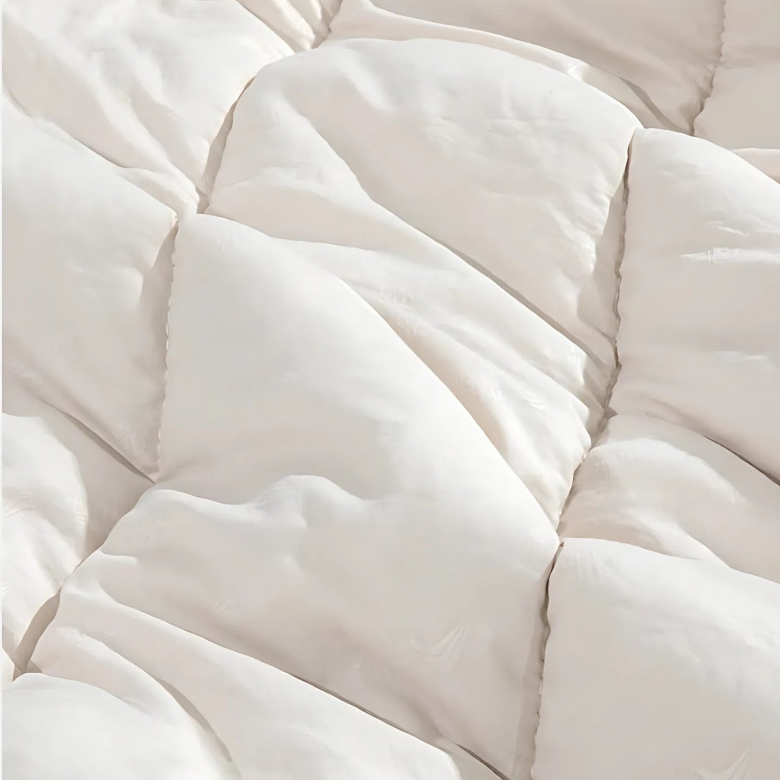Sac De Couchage 2 Personnes Détachable gros plan texture matelassée - 12°C à 20°C / 2.6Kg - 5°C à 10°C / 3.2Kg