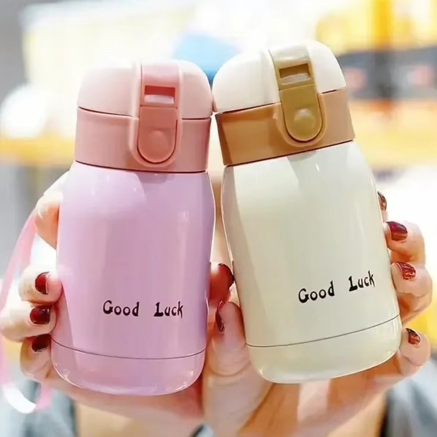 Mini Gourde Isotherme 200ml deux gourdes en main - Rose - Blanc - Framboise - Turquoise - Orange