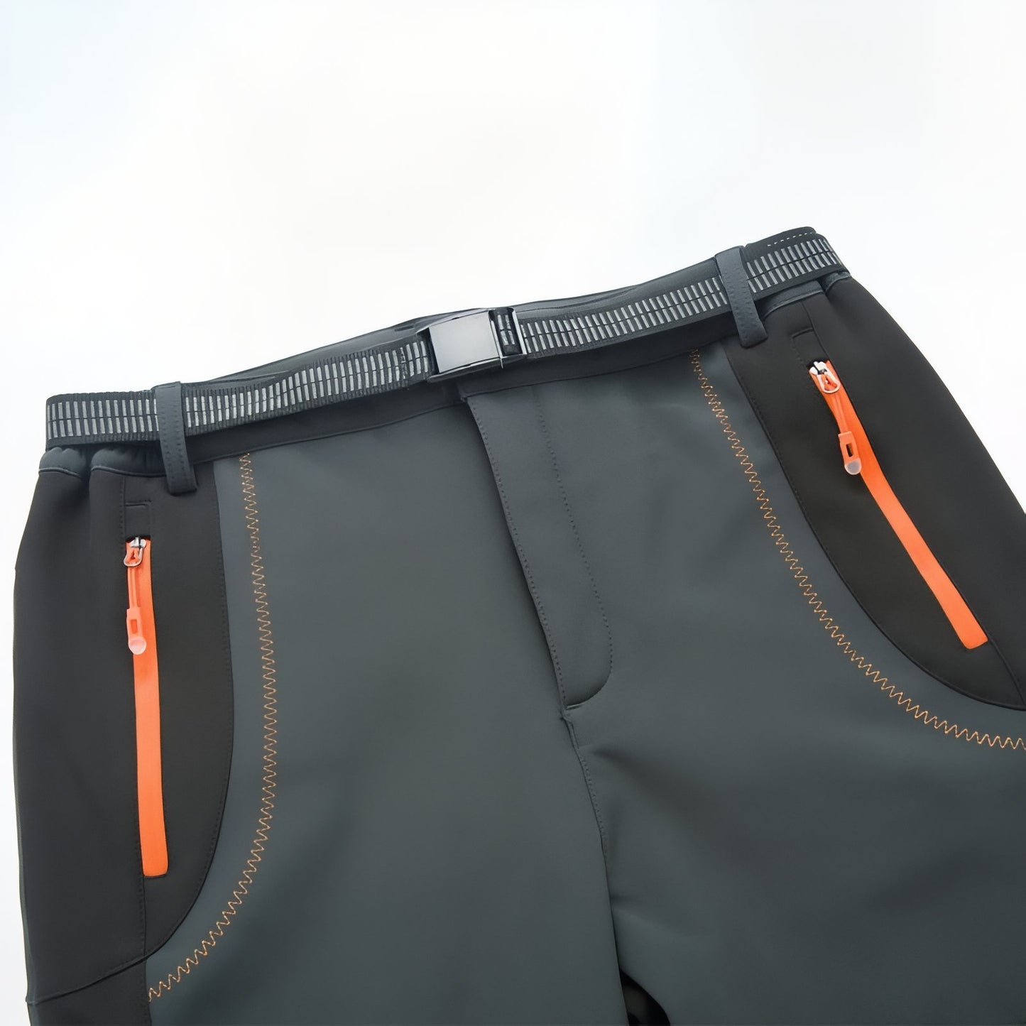Pantalon Randonnée Déperlant Homme gros plan fermeture zippée - Vert Foncé et Noir - Gris Foncé et Orange - Noir et Orange